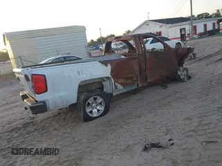 2014 Chevrolet Silverado 1500 with VIN 1GCNCREH7EZ137584, listed as a IAAI auction lot 41925804 with Not Provided miles and . Bid and sale history available at DreamBid. Image 4.