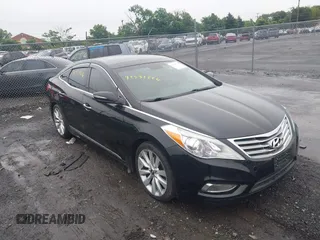 2013 Hyundai Azera z VIN KMHFH4JG5DA328645, wystawiony jako IAAI lot #42531226 z przebiegiem 82 403 mil mil oraz . Historia ofert i sprzedaży dostępna na DreamBid. Obrazek 1.