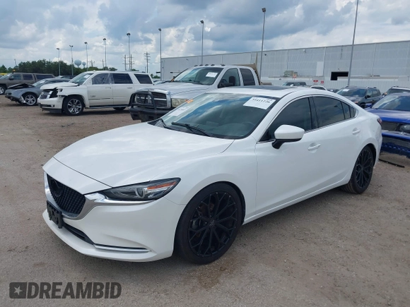 2018 Mazda 6 Grand Touring Reserve with VIN JM1GL1WY1J1321517, listed as a IAAI auction lot 39411226 with 50,280 mi miles and . Bid and sale history available at DreamBid. Image 17.