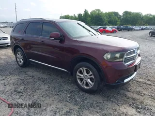 2012 Dodge Durango Crew z VIN 1C4RDHDG1CC144421, wystawiony jako IAAI lot #42232137 z przebiegiem 215 051 mil mil oraz . Historia ofert i sprzedaży dostępna na DreamBid. Obrazek 1.