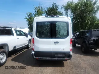 2018 Ford Transit z VIN 1FTYE1CM3JKB42289, wystawiony jako IAAI lot #42717396 z przebiegiem 88 406 mil mil oraz . Historia ofert i sprzedaży dostępna na DreamBid. Obrazek 28.
