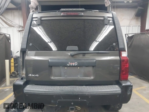 2006 Jeep Commander with VIN 1J8HG48KX6C263348, listed as a IAAI auction lot 42128039 with 208,605 mi miles and . Bid and sale history available at DreamBid. Image 17.