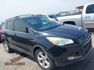 2014 Ford Escape SE z VIN 1FMCU0G96EUD57930, wystawiony jako IAAI lot #42347567 z przebiegiem 169 128 mil mil oraz . Historia ofert i sprzedaży dostępna na DreamBid. Obrazek 1.