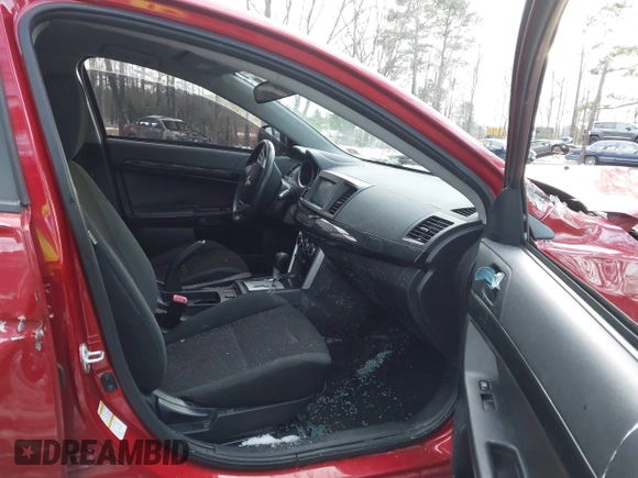 2016 Mitsubishi Lancer SE with VIN JA32V2FW7GU004159, listed as a IAAI auction lot 41401386 with 100,536 mi miles. Bid and sale history available at carsss.com. Image 5.