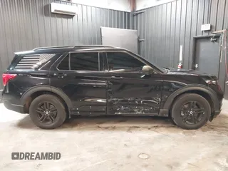 2023 Ford Explorer XLT with VIN 1FMSK8DHXPGC42017, listed as a IAAI auction lot 42009972 with 16,945 mi miles and . Bid and sale history available at DreamBid. Image 6.
