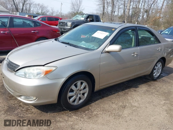 2004 Toyota Camry LE with VIN 4T1BF30K94U587836, listed as a IAAI auction lot 41714277 with 211,893 mi miles and . Bid and sale history available at carsss.com. Image 17.