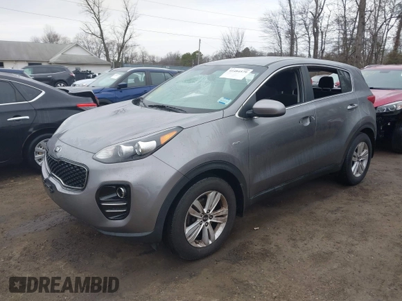 2018 Kia Sportage LX with VIN KNDPMCAC7J7393243, listed as a IAAI auction lot 41484579 with 122,022 mi miles. Bid and sale history available at carsss.com. Image 17.
