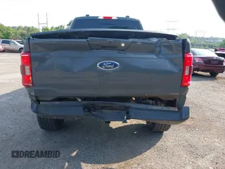 2021 Ford F-150 XL with VIN 1FTFW1E85MKD35973, listed as a IAAI auction lot 42381874 with 57,982 mi miles and . Bid and sale history available at DreamBid. Image 17.