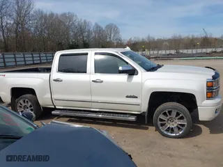 2015 Chevrolet Silverado 1500 High Country with VIN 3GCUKTEC7FG205805, listed as a IAAI auction lot 41815859 with 130,028 mi miles. Bid and sale history available at carsss.com. Image 13.
