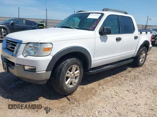 2007 Ford Explorer Sport Trac XLT z VIN 1FMEU31K17UA04200, wystawiony jako IAAI lot #42733514 z przebiegiem 180 899 mil mil oraz . Historia ofert i sprzedaży dostępna na DreamBid. Obrazek 2.