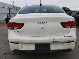 2023 Kia Rio LX with VIN 3KPA24AD0PE566085, listed as a Copart auction lot 50354455 with 65,203 mi miles and Salvage Title. Bid and sale history available at DreamBid. Image 6.