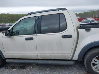 2010 Ford Explorer Sport Trac XLT z VIN 1FMEU3BE3AUA02528, wystawiony jako IAAI lot #41940283 z przebiegiem 96 049 mil mil oraz . Historia ofert i sprzedaży dostępna na DreamBid. Obrazek 14.