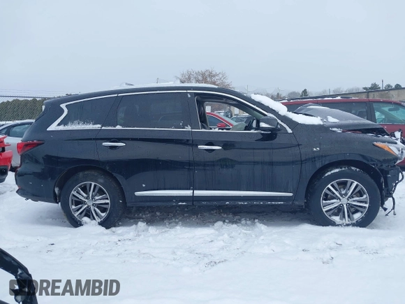 2016 Infiniti QX60 with VIN 5N1AL0MM9GC530142, listed as a IAAI auction lot 40989376 with 116,782 mi miles and . Bid and sale history available at DreamBid. Image 14.