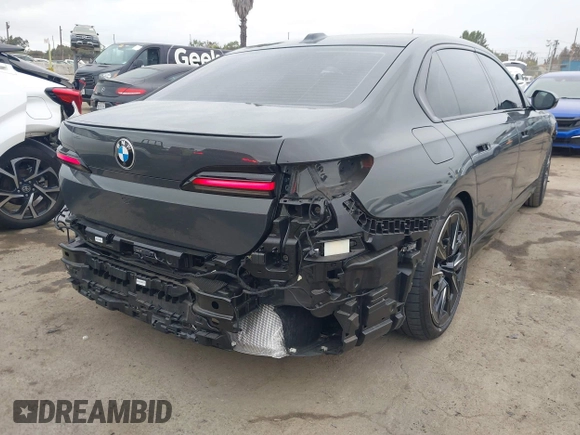 2024 BMW 7 Series 740i with VIN WBA23EH01RCP35452, listed as a IAAI auction lot 42064471 with 13,657 mi miles and . Bid and sale history available at DreamBid. Image 4.
