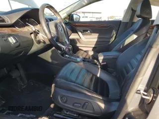 2012 Volkswagen CC Lux Limited with VIN WVWHN7AN5CE537803, listed as a Copart auction lot 82511734 with 124,416 mi miles and Salvage Title. Bid and sale history available at carsss.com. Image 7.