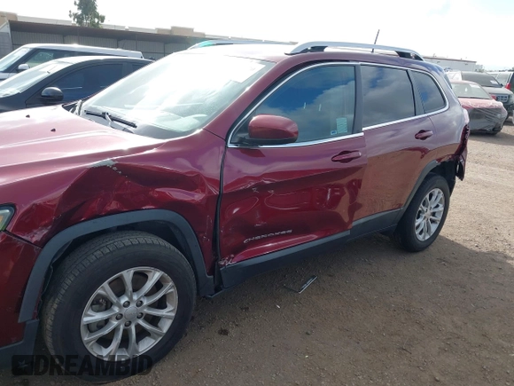 2019 Jeep Cherokee Latitude with VIN 1C4PJLCX5KD347695, listed as a IAAI auction lot 41910370 with 86,713 mi miles and . Bid and sale history available at carsss.com. Image 6.