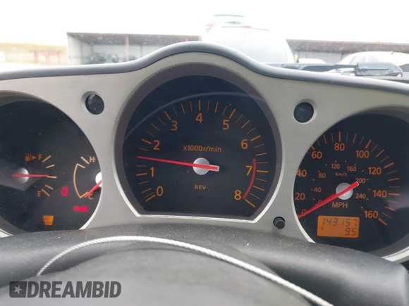 2005 Nissan 350Z Enthusiast z VIN JN1AZ34D25M605438, wystawiony jako IAAI lot #42131179 z przebiegiem 143 157 mil mil oraz . Historia ofert i sprzedaży dostępna na DreamBid. Obrazek 7.
