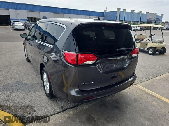 2018 Chrysler Pacifica Touring with VIN 2C4RC1DG1JR148709, listed as a IAAI auction lot 42787000 with 84,531 mi miles and . Bid and sale history available at DreamBid. Image 2.
