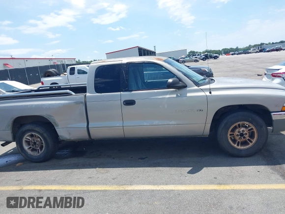 1999 Dodge Dakota SLT z VIN 1B7GL22X9XS258964, wystawiony jako IAAI lot #42309862 z przebiegiem 177 561 mil mil oraz . Historia ofert i sprzedaży dostępna na DreamBid. Obrazek 13.