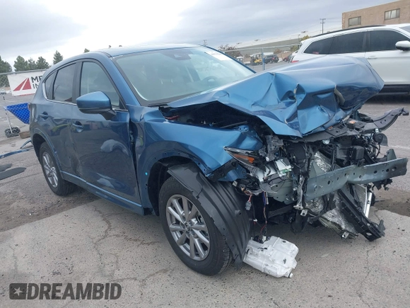 2024 Mazda CX-5 S Carbon Edition z VIN JM3KFBCL2R0454425, wystawiony jako IAAI lot #40934280 z przebiegiem 4 094 mil mil oraz . Historia ofert i sprzedaży dostępna na DreamBid. Obrazek 1.
