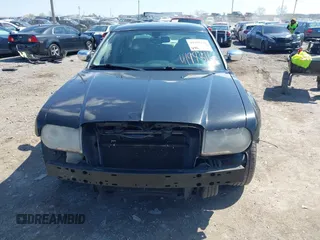 2006 Chrysler 300 C with VIN 2C3LA63H96H490736, listed as a IAAI auction lot 41998112 with 184,090 mi miles. Bid and sale history available at carsss.com. Image 12.