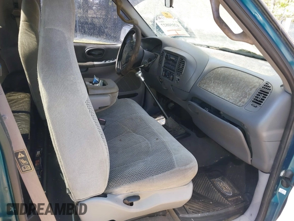 2000 Ford F-150 XL with VIN 1FTZF0722YKB38958, listed as a IAAI auction lot 42050827 with 235,315 mi miles. Bid and sale history available at carsss.com. Image 5.