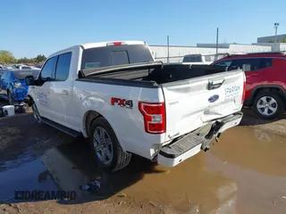 2018 Ford F-150 XL with VIN 1FTEW1EG1JKE29623, listed as a IAAI auction lot 40615703 with 122,846 mi miles and . Bid and sale history available at DreamBid. Image 3.