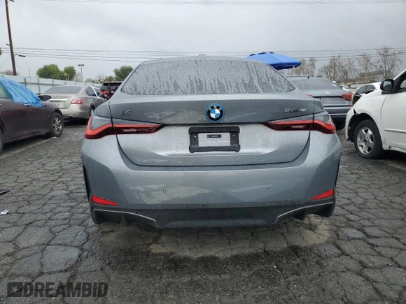 2023 BMW i4 eDrive40 with VIN WBY73AW08PFR23464, listed as a Copart auction lot 43525124 with 6,596 mi miles. Bid and sale history available at carsss.com. Image 6.