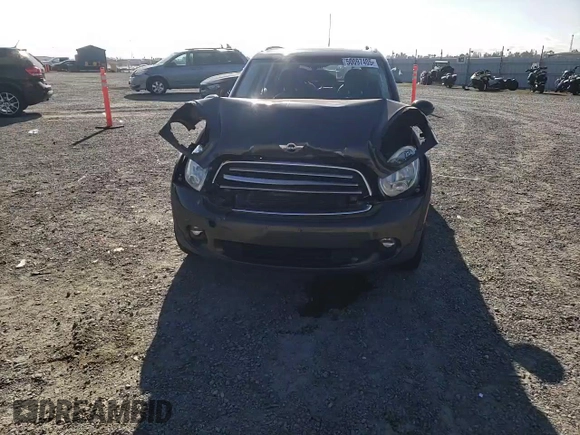 2012 MINI Countryman with VIN WMWZB3C58CWM03815, listed as a Copart auction lot 50097405 with 84,137 mi miles and Salvage Title. Bid and sale history available at DreamBid. Image 11.