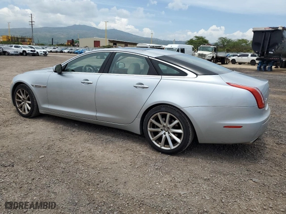 2011 Jaguar XJ with VIN SAJWA1CB9BLV05595, listed as a Copart auction lot 54947855 with 39,516 mi miles and Salvage Title. Bid and sale history available at carsss.com. Image 2.