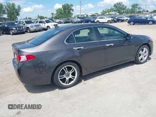 2010 Acura TSX with VIN JH4CU2F67AC015456, listed as a IAAI auction lot 42583419 with 220,012 mi miles and . Bid and sale history available at DreamBid. Image 4.