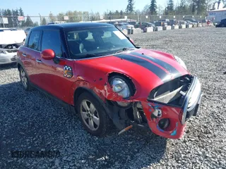 2015 MINI Hardtop 4 Door with VIN WMWXS5C59FT829635, listed as a IAAI auction lot 42046985 with 171,731 mi miles and . Bid and sale history available at DreamBid. Image 1.