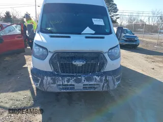2021 Ford Transit Cargo with VIN 1FTBW3X82MKA14027, listed as a IAAI auction lot 41423524 with 121,221 mi miles. Bid and sale history available at carsss.com. Image 12.