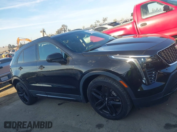 2019 Cadillac XT4 FWD Sport z VIN 1GYFZER43KF183181, wystawiony jako IAAI lot #41869141 z przebiegiem 25 539 mil mil oraz . Historia ofert i sprzedaży dostępna na DreamBid. Obrazek 13.
