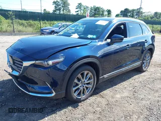 2019 Mazda CX-9 Grand Touring with VIN JM3TCBDY6K0335886, listed as a IAAI auction lot 42704250 with 37,171 mi miles and . Bid and sale history available at DreamBid. Image 21.