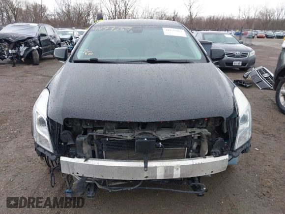 2014 Cadillac XTS Platinum with VIN 2G61W5S84E9291640, listed as a IAAI auction lot 41877867 with 100,462 mi miles and . Bid and sale history available at DreamBid. Image 12.