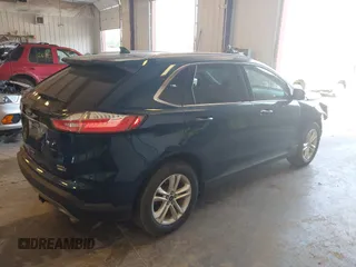 2020 Ford Edge SEL with VIN 2FMPK4J90LBA09924, listed as a IAAI auction lot 42514596 with 100,275 mi miles and . Bid and sale history available at DreamBid. Image 4.