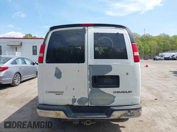 2005 Chevrolet Express Passenger with VIN 1GAHG35U051181753, listed as a IAAI auction lot 42074333 with 335,090 mi miles and . Bid and sale history available at DreamBid. Image 16.