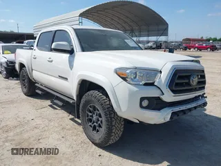 2022 Toyota Tacoma SR5 with VIN 3TMAZ5CN4NM165679, listed as a IAAI auction lot 42015551 with 54,372 mi miles and . Bid and sale history available at DreamBid. Image 1.