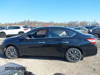 2015 Nissan Sentra S with VIN 3N1AB7AP7FY227075, listed as a IAAI auction lot 41983590 with 115,122 mi miles. Bid and sale history available at carsss.com. Image 14.