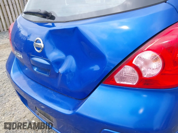2009 Nissan Versa 1.8 S with VIN 3N1BC13E79L425943, listed as a IAAI auction lot 42198557 with 217,059 mi miles. Bid and sale history available at carsss.com. Image 6.