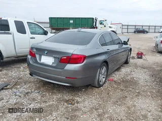 2013 BMW 5 Series 528i with VIN WBAXG5C5XDD229845, listed as a IAAI auction lot 41457088 with 130,826 mi miles and . Bid and sale history available at carsss.com. Image 4.