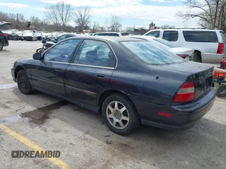 1995 Honda Accord LX with VIN JHMCD5631SC011203, listed as a IAAI auction lot 41891231 with 198,682 mi miles and . Bid and sale history available at carsss.com. Image 3.