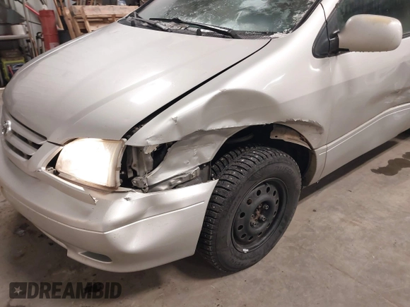 2003 Toyota Sienna LE with VIN 4T3ZF13C53U528294, listed as a IAAI auction lot 41550248 with 192,907 mi miles. Bid and sale history available at carsss.com. Image 6.
