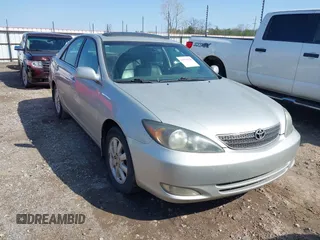 2003 Toyota Camry LE with VIN 4T1BE32K03U259171, listed as a IAAI auction lot 41912120 with 274,162 mi miles and . Bid and sale history available at DreamBid. Image 1.