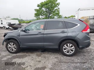 2013 Honda CR-V EX z VIN 2HKRM4H53DH621633, wystawiony jako IAAI lot #42270471 z przebiegiem Nie podano mil oraz . Historia ofert i sprzedaży dostępna na DreamBid. Obrazek 14.