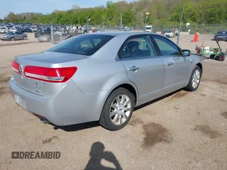 2011 Lincoln MKZ with VIN 3LNHL2GC1BR754870, listed as a IAAI auction lot 42220451 with 143,922 mi miles and . Bid and sale history available at DreamBid. Image 4.