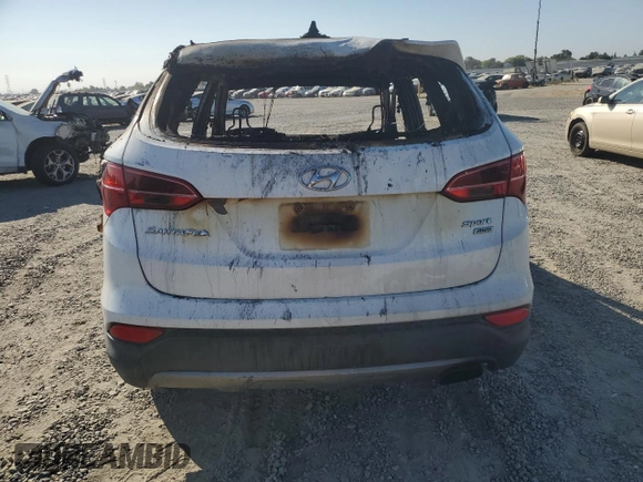 2014 Hyundai Santa Fe z VIN 5XYZTDLB0EG175658, wystawiony jako Copart lot #65454624 z przebiegiem Nie podano mil oraz Nie do naprawy. Historia ofert i sprzedaży dostępna na DreamBid. Obrazek 6.