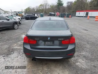 2013 BMW 3 Series 328i xDrive with VIN WBA3B3C56DF542509, listed as a IAAI auction lot 42010587 with 187,082 mi miles. Bid and sale history available at carsss.com. Image 16.
