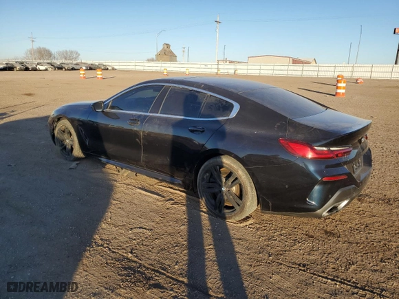 2020 BMW 8 Series M850i with VIN WBAGV8C08LCE52579, listed as a Copart auction lot 43185735 with 55,574 mi miles and Salvage Title. Bid and sale history available at carsss.com. Image 2.
